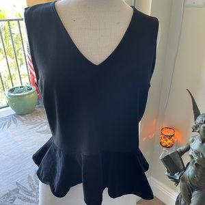 J Crew knit peplum top. Jersey top & velvet peplum. Size large